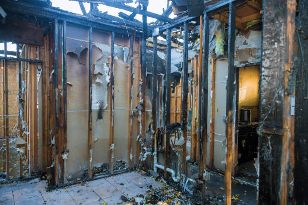 Professional Fire Damage Restoration technician working in Northport, NY